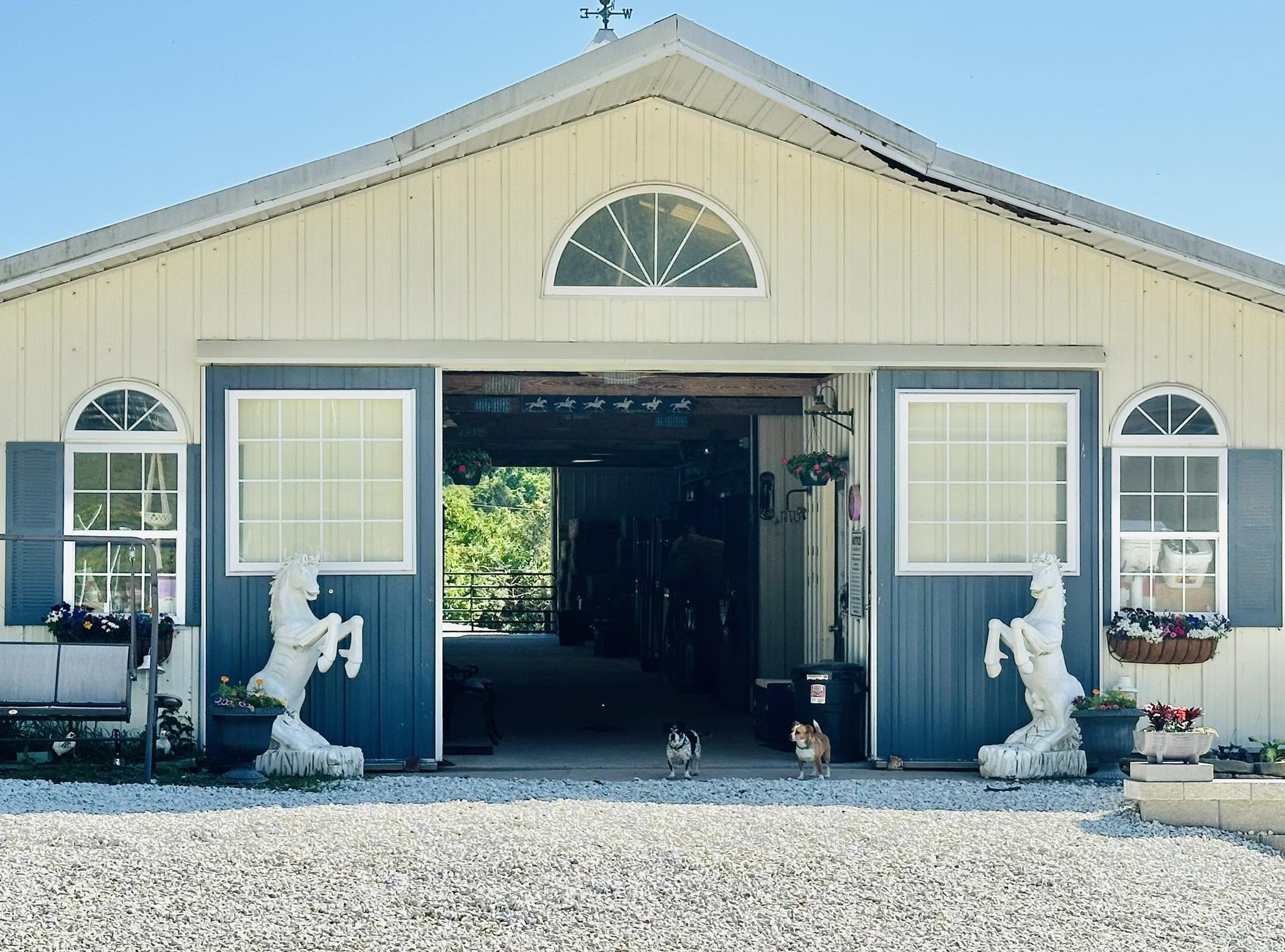The barn at Perfect Stride Equestrian on a sunny day